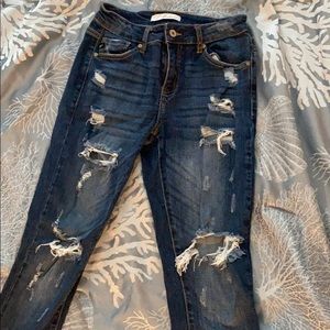 Universal distressed dark wash jeans by Kancan